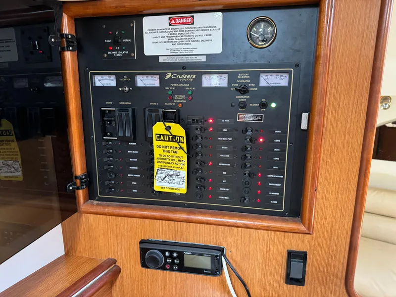 Slide: The Image of Electrical control panel of a 2004 Cruisers Yachts 320 Express boat. - 27