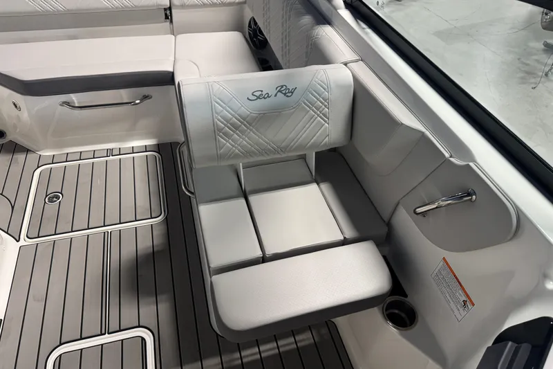 Slide: The Image of 2026 Sea Ray SDX 230 boat interior with luxurious seating and modern design. - 11