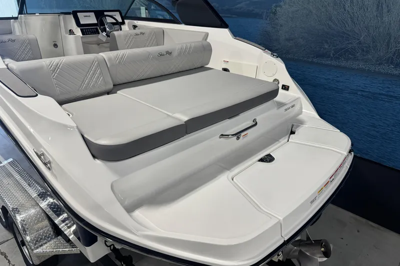 Slide: The Image of 2026 Sea Ray SDX 230 boat with luxurious seating and modern design. - 6