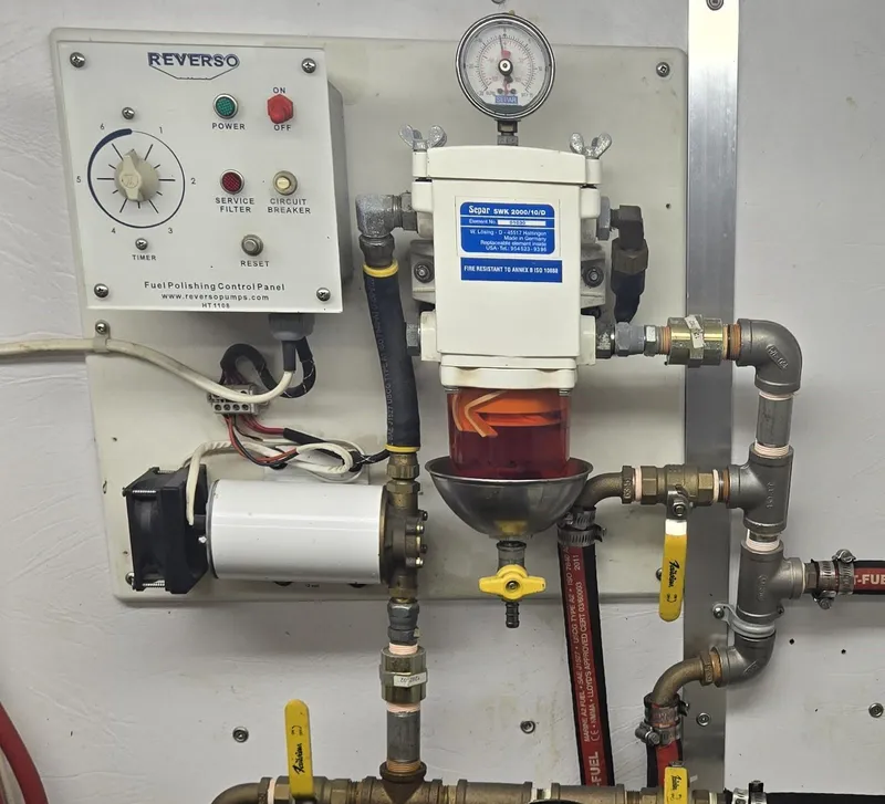 Slide: The Image of Fuel polishing system on a 2012 Custom Steel Trawler, featuring Reverso control panel and Separ filter. - 58
