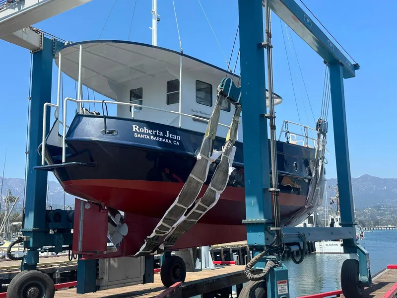 Slide: The Image of Custom 2012 Steel Trawler "Roberta Jean" in boat lift at Santa Barbara harbor. - 8