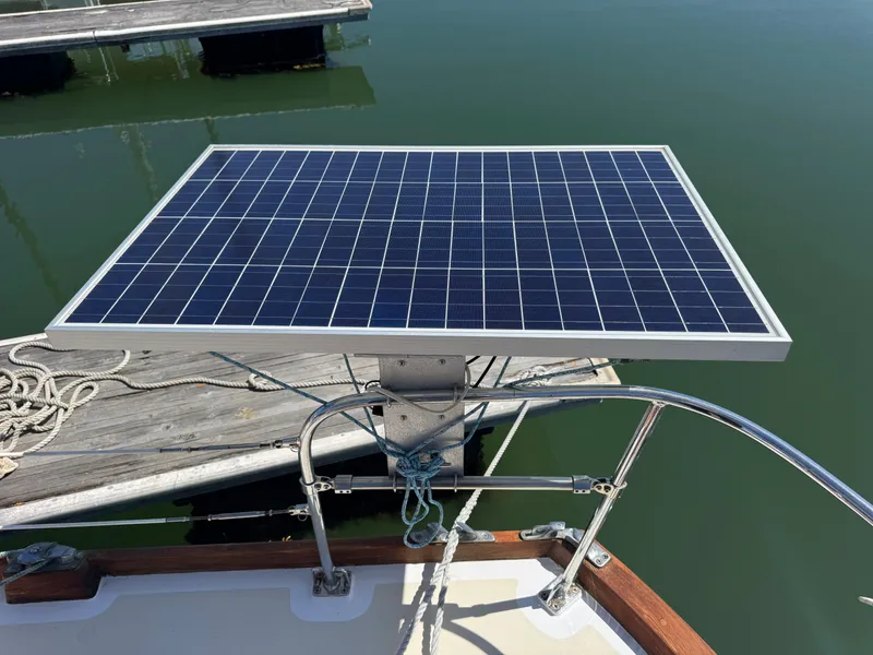Slide: The Image of Solar panel on 1970 Cheoy Lee Luders 36 yacht, docked by calm water. - 11