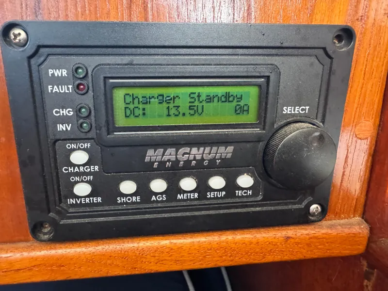 Slide: The Image of Magnum Energy charger display on 1970 Cheoy Lee Luders 36 sailboat, showing standby mode. - 21