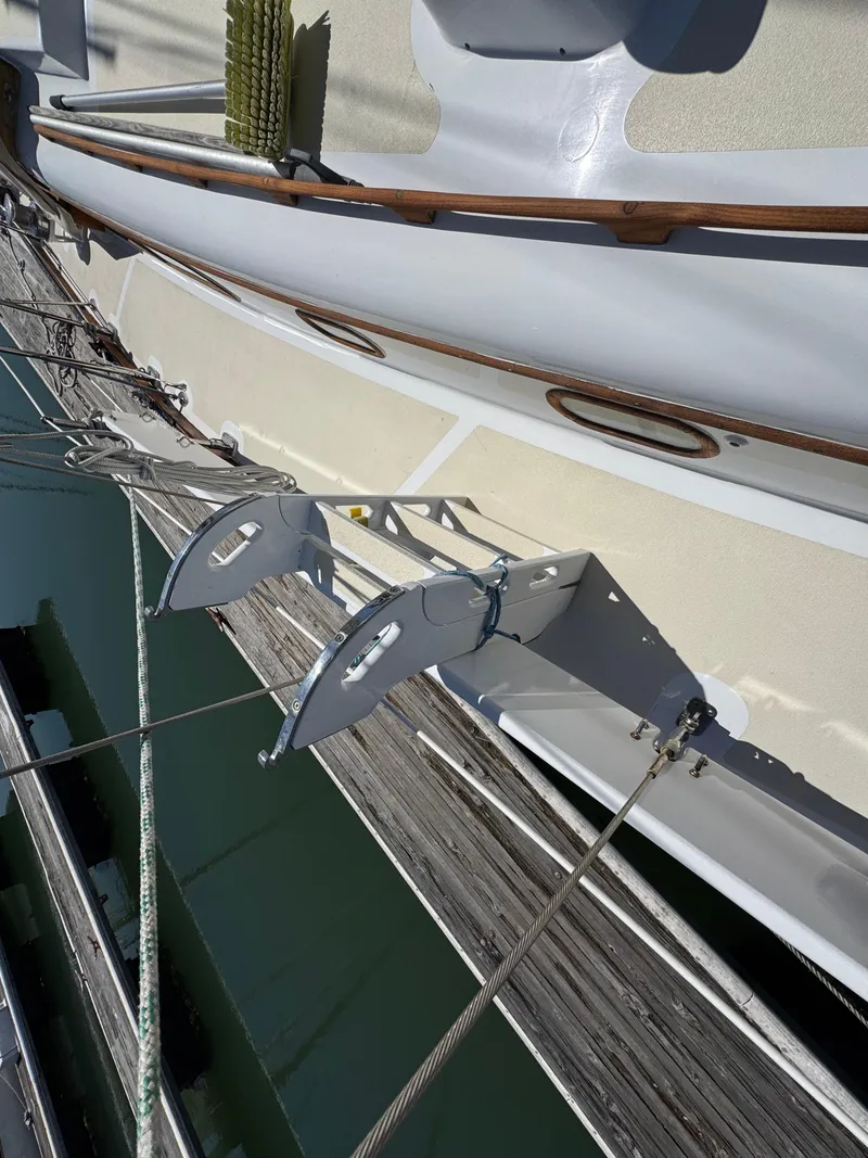 Slide: The Image of 1970 Cheoy Lee Luders 36 sailboat deck with ropes and anchor detail. - 32