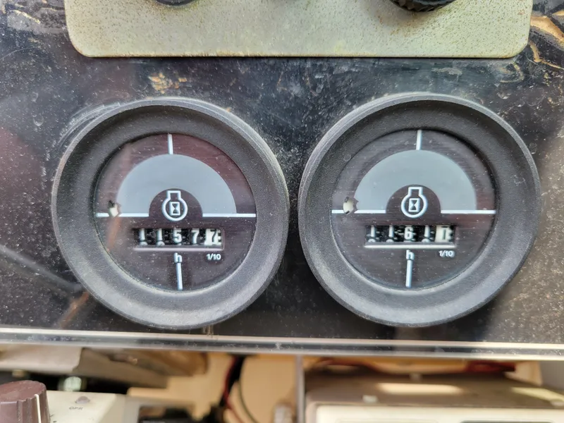 Slide: The Image of 1979 Bayliner 3250 boat docked at marina, featuring classic design and sleek lines. - 6