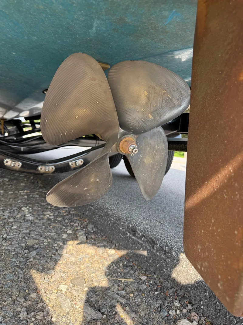 Slide: The Image of Close-up of a 2022 Axis T250 boat propeller on a trailer. - 9
