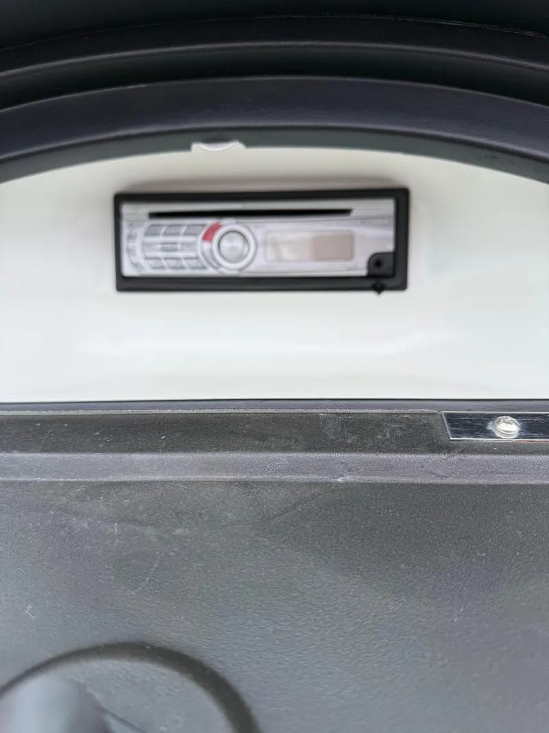 Slide: The Image of Dashboard of a 2008 Sea Ray 175 Sport boat with a stereo system. - 15