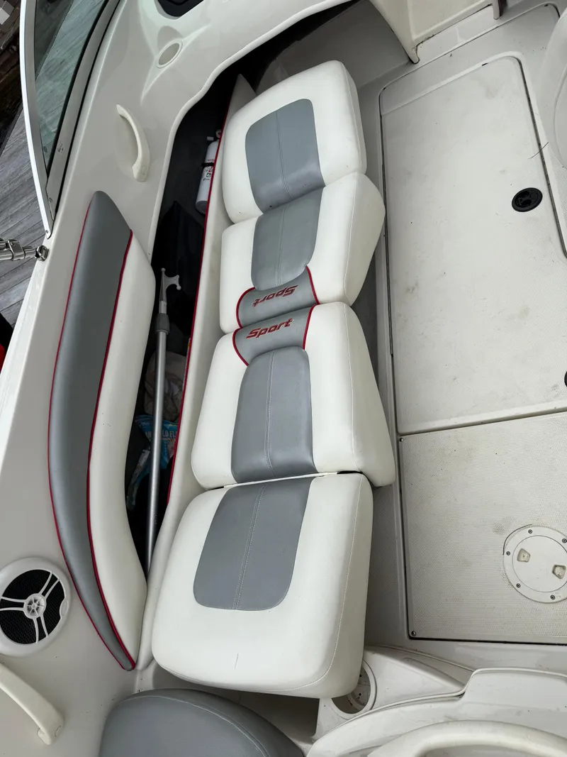 Slide: The Image of 2008 Sea Ray 175 Sport boat interior with white and gray seating. - 7
