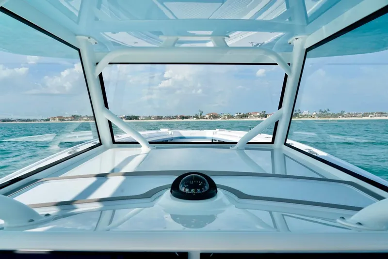 Slide: The Image of 2023 Yellowfin 42 boat interior with ocean view through windshield. - 22