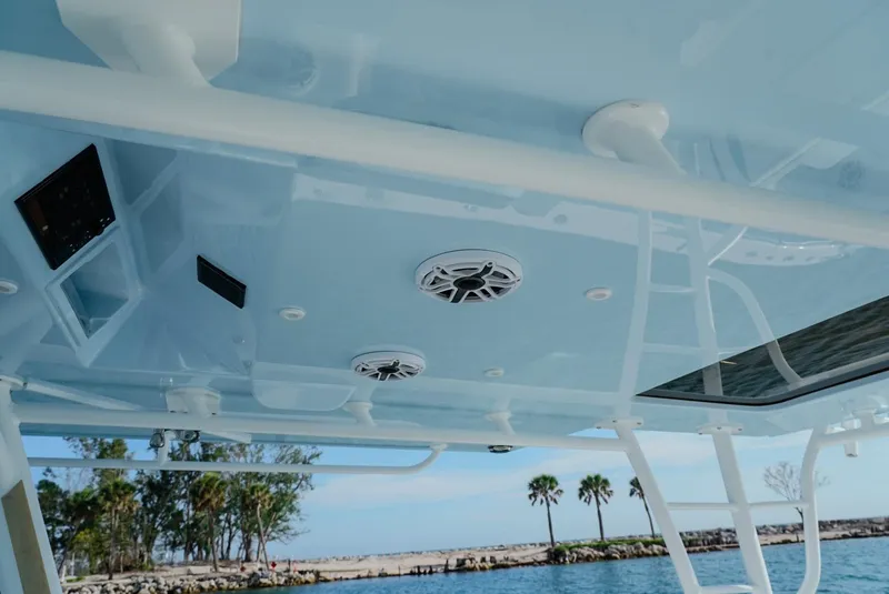 Slide: The Image of 2023 Yellowfin 42 boat ceiling with speakers and ocean view. - 24
