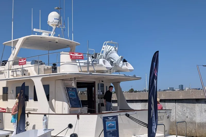 Slide: The Image of Luxury Tide Craft Nantucket 12 yacht docked, showcasing modern design, 2026 model. - 7