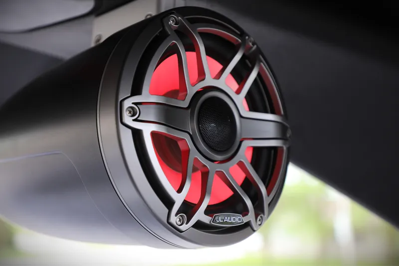 Slide: The Image of Red and black JL Audio speaker in Viaggio Diamante UWA 2025 vehicle. - 20