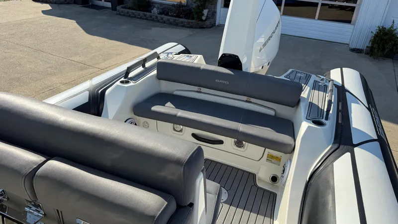 Slide: The Image of 2022 Brig Eagle 8 boat interior with gray seating and modern design. - 10