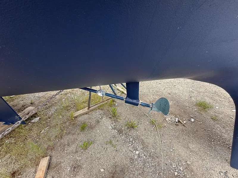 Slide: The Image of Bottom view of a 1982 Tartan 37 sailboat hull and propeller on dry land. - 2