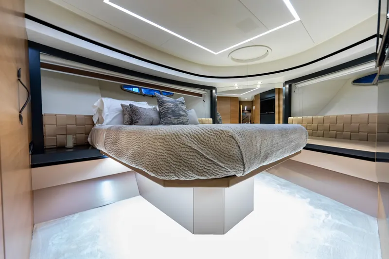 Slide: The Image of Luxurious bedroom interior of 2012 Pershing 92 yacht with modern design and ambient lighting. - 19