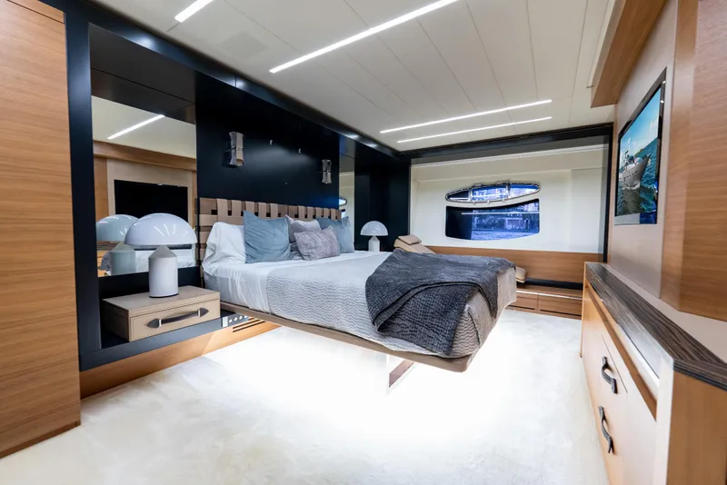 Slide: The Image of Luxurious bedroom interior of 2012 Pershing 92 yacht with modern design and elegant furnishings. - 20