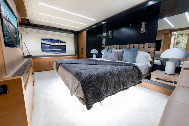 Slide: The Image of Luxurious bedroom interior of 2012 Pershing 92 yacht with modern design and elegant furnishings. - 24
