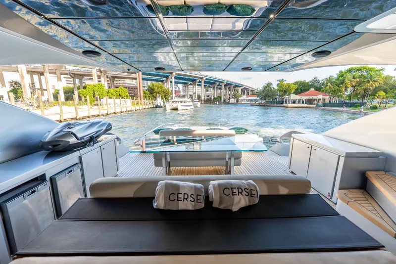 Slide: The Image of Luxurious 2012 Pershing 92 yacht interior with waterfront view and modern amenities. - 34