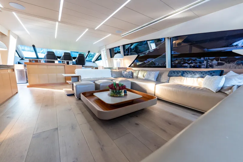 Slide: The Image of Luxurious interior of a 2012 Pershing 92 yacht with modern seating and elegant decor. - 38