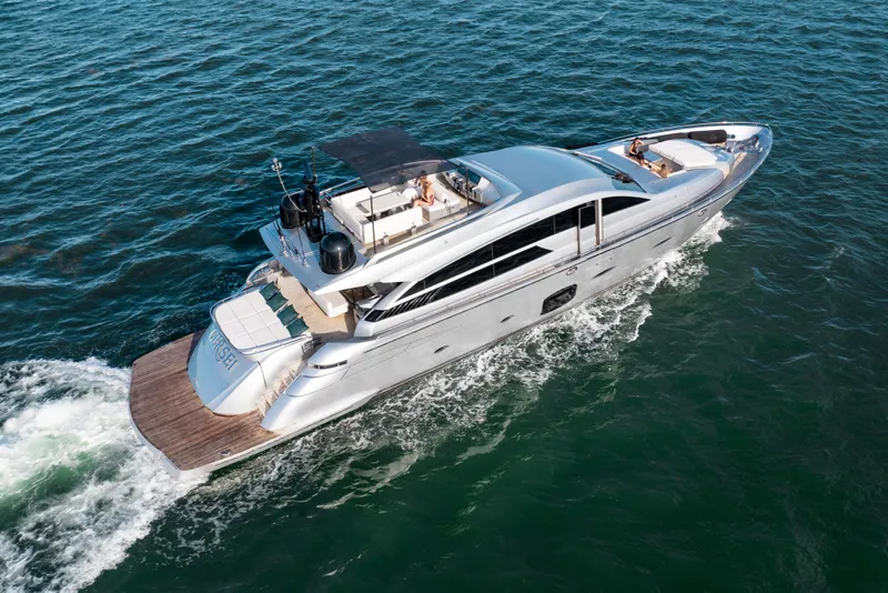 Slide: The Image of Luxury 2012 Pershing 92 yacht cruising on open water, aerial view. - 4