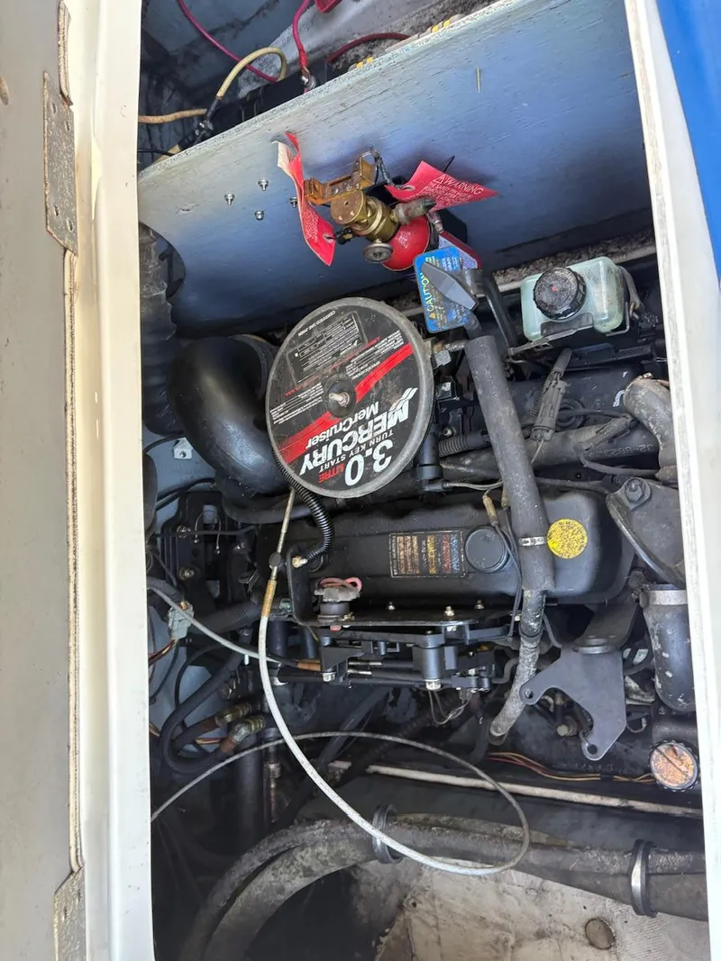 Slide: The Image of Engine compartment of a 2006 Maxum 1800 SR3 with a 3.0L MerCruiser engine. - 3