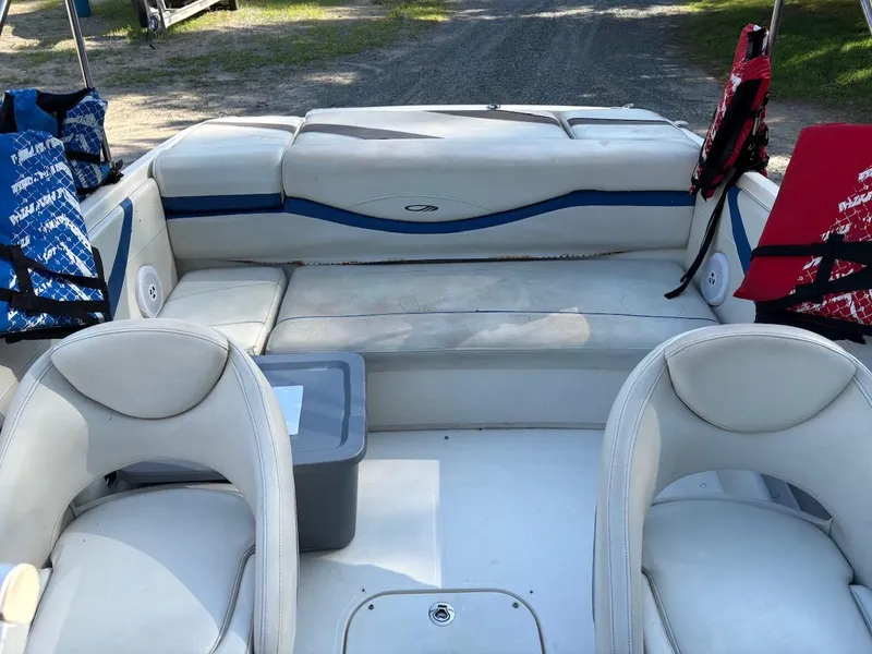 Slide: The Image of 2006 Maxum 1800 SR3 boat interior with white seating and life jackets. - 4