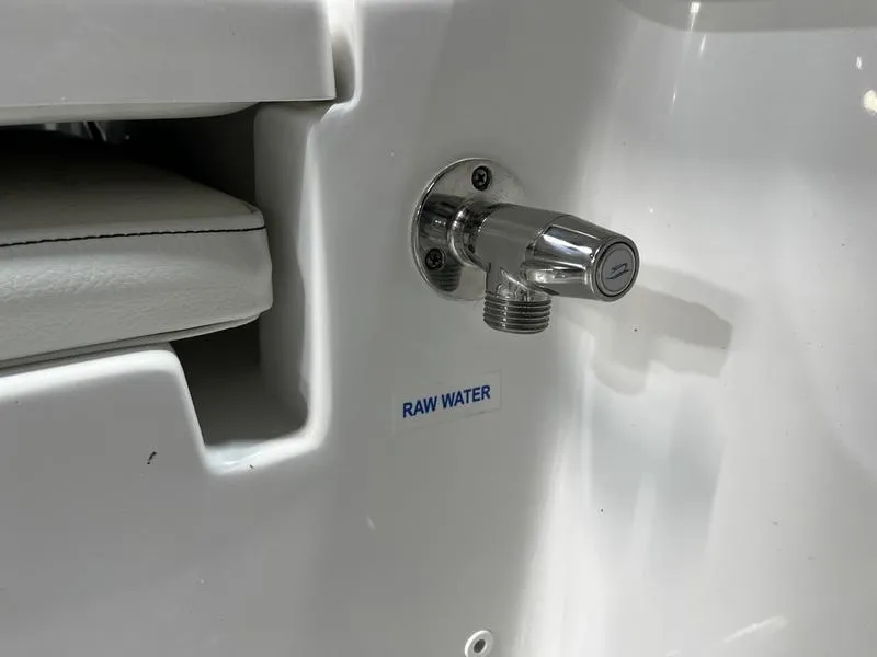 Slide: The Image of Chrome raw water outlet on 2025 Tidewater 1910 Bay Max boat. - 7