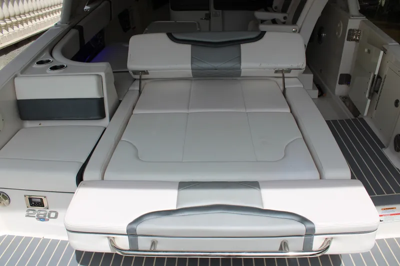 Slide: The Image of 2021 Chaparral 280 OSX boat interior with convertible seating and modern design. - 16