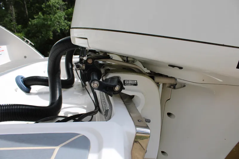 Slide: The Image of 2021 Chaparral 280 OSX boat engine detail with cables and components. - 29