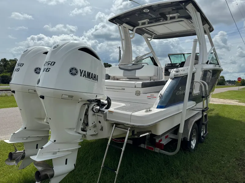 Slide: The Image of 2021 Chaparral 280 OSX boat with twin Yamaha 250 V6 engines on a trailer. - 36