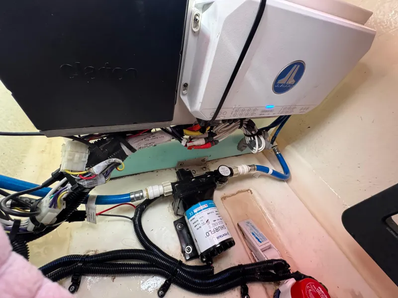 Slide: The Image of Electrical components and wiring inside a 2021 Chaparral 280 OSX boat. - 37