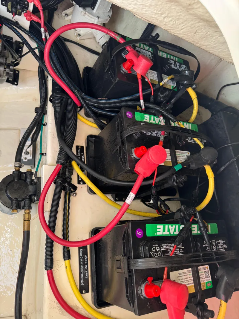 Slide: The Image of Batteries and wiring inside a 2021 Chaparral 280 OSX boat. - 40