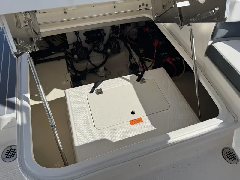 Slide: The Image of Open engine compartment of 2021 Chaparral 280 OSX boat, showing internal components and wiring. - 41