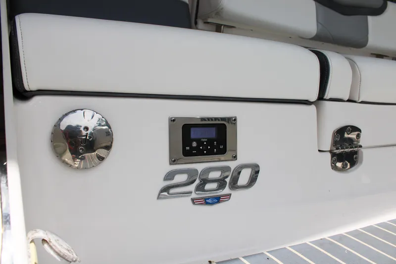 Slide: The Image of 2021 Chaparral 280 OSX boat interior with control panel and seating. - 7