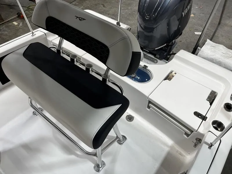 Slide: The Image of 2025 Tidewater 1910 Bay Max boat interior with seating and Yamaha engine. - 5