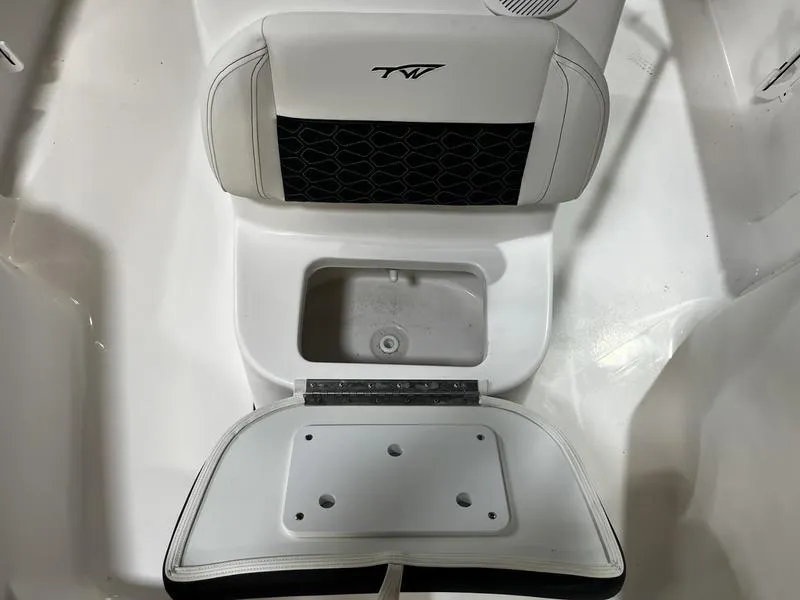 Slide: The Image of 2025 Tidewater 1910 Bay Max boat seat with storage compartment open. - 9