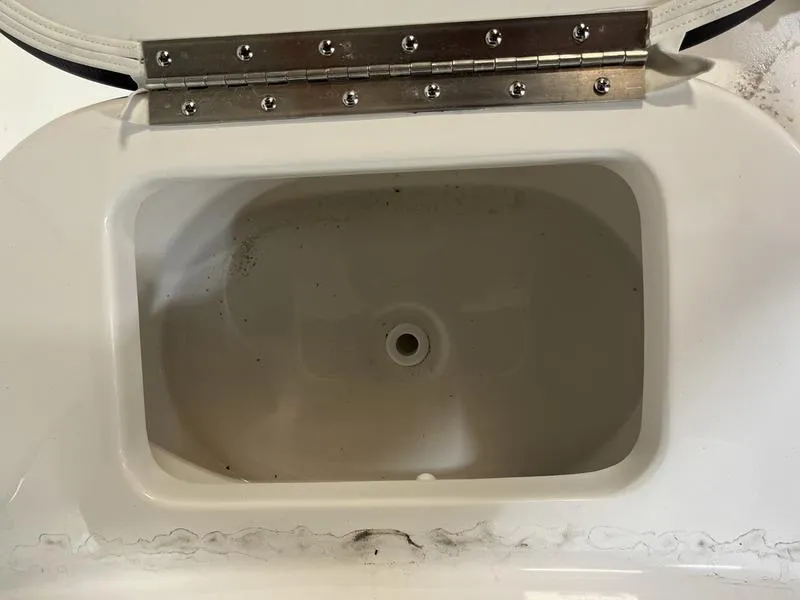 Slide: The Image of Open storage compartment on 2025 Tidewater 1910 Bay Max boat. - 12