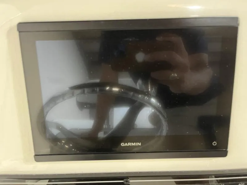 Slide: The Image of Garmin display on 2025 Tidewater 1910 Bay Max boat dashboard. - 7