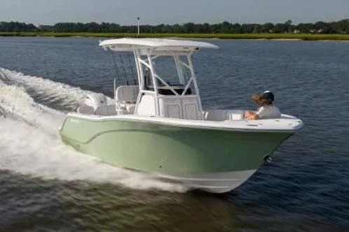 Slide: The Image of Manufacturer Provided Image: 2025 Sea Fox 228 Commander boat cruising on a calm lake. - 3