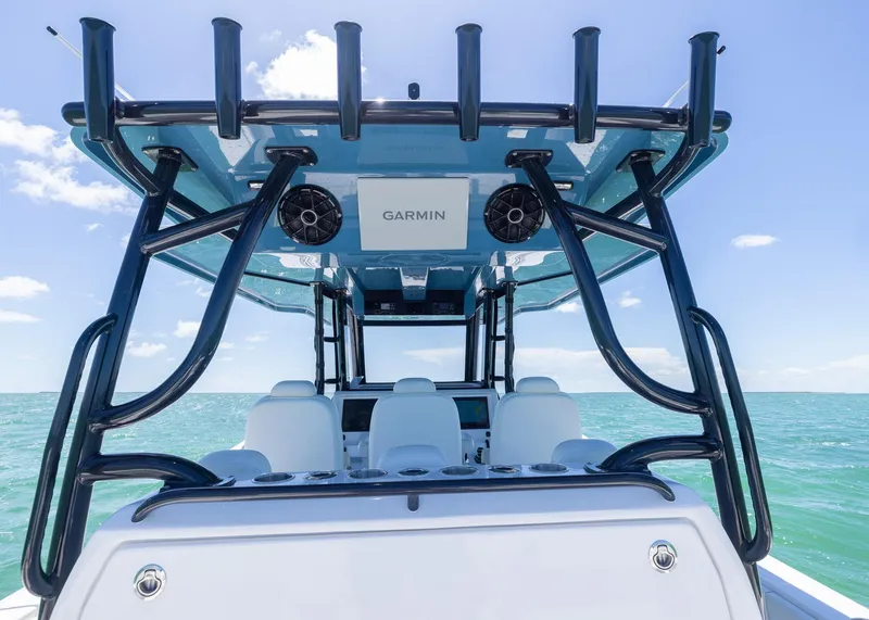 Slide: The Image of 2025 Invincible 43 Open Fisherman boat with Garmin equipment on open sea. - 23