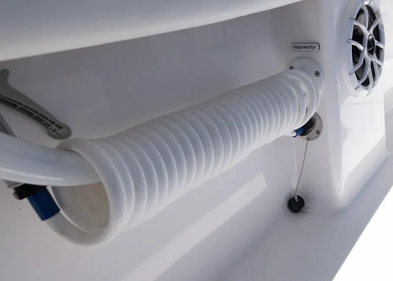 Slide: The Image of Freshwater hose and speaker on 2025 Invincible 43 Open Fisherman boat. - 37