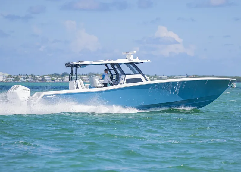 Slide: The Image of 2025 Invincible 43 Open Fisherman cruising on the ocean. - 42