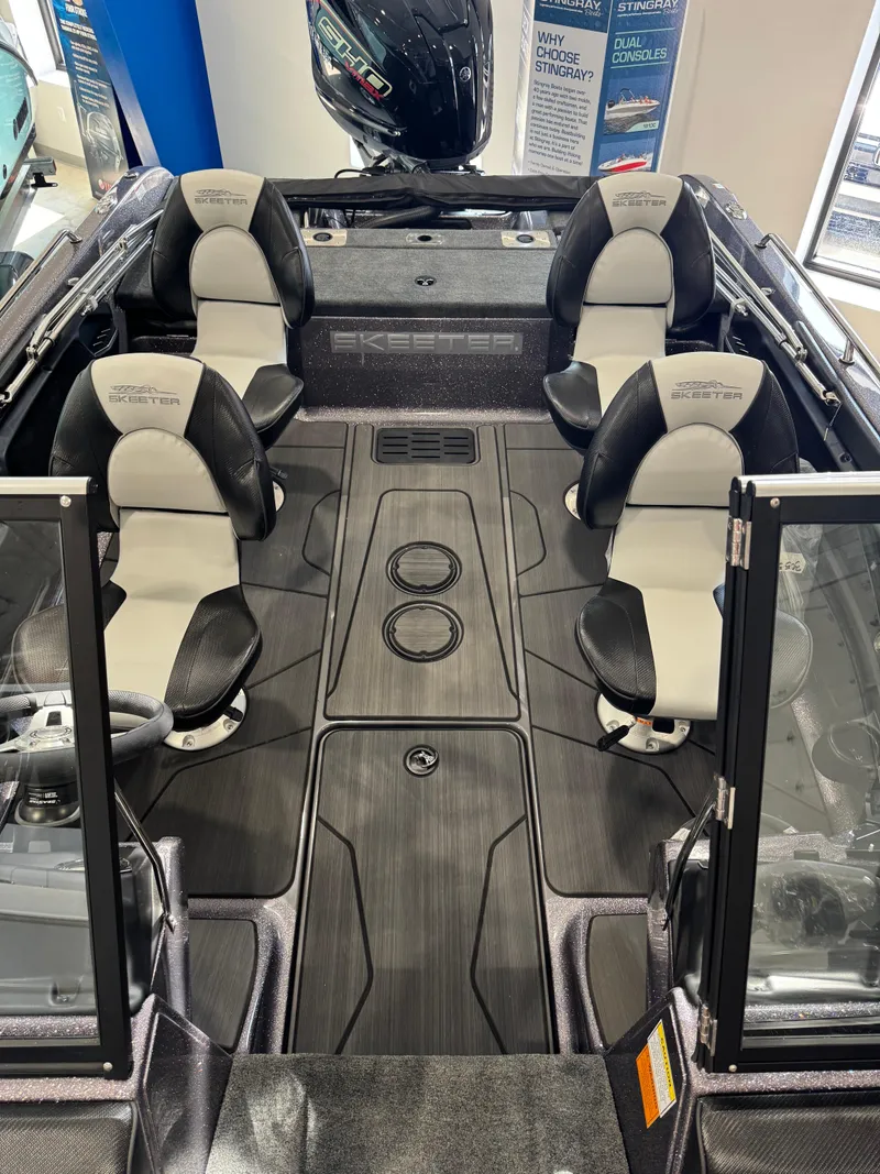Slide: The Image of 2025 Skeeter Solera 189 boat interior with four seats and sleek design. - 18
