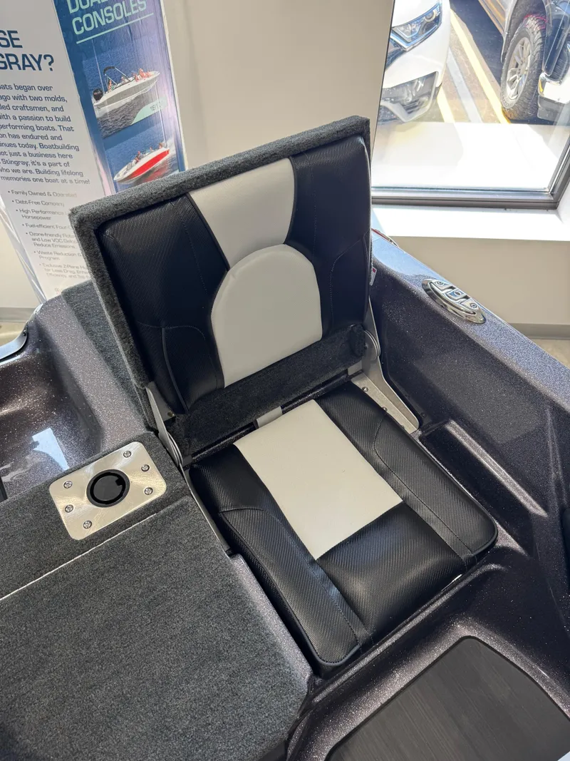 Slide: The Image of 2025 Skeeter Solera 189 boat seat with black and white upholstery. - 28