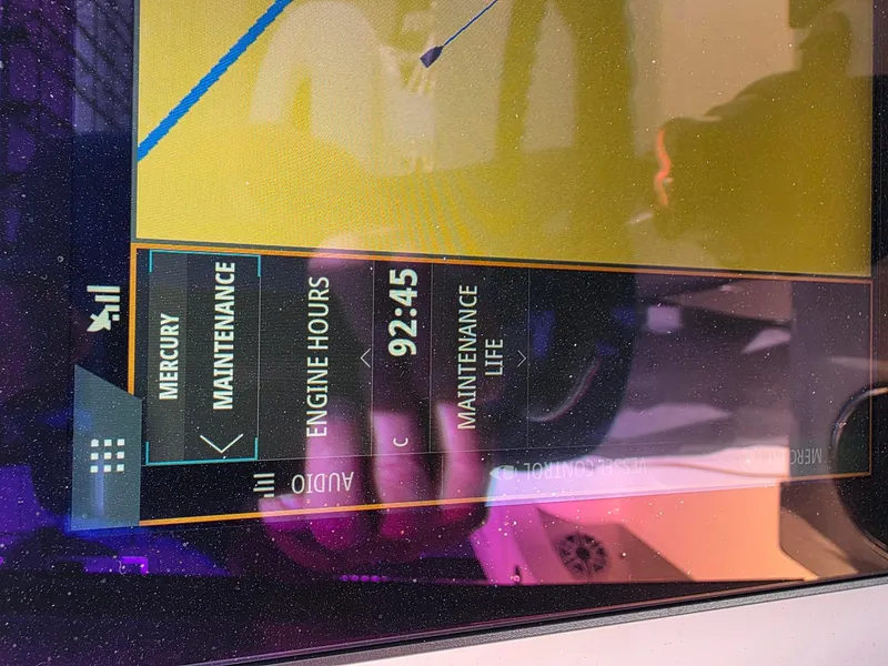 Slide: The Image of Display screen showing Mercury maintenance details on a 2023 SeaVee 270Z boat. - 9