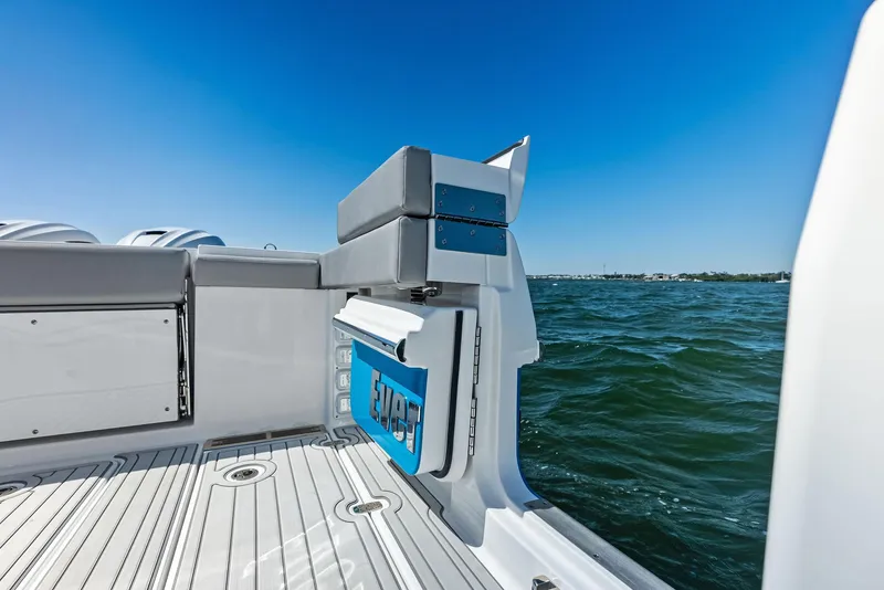 Slide: The Image of Touchscreen control panel of 2026 Everglades 367 CX boat with navigation and pump settings. - 14
