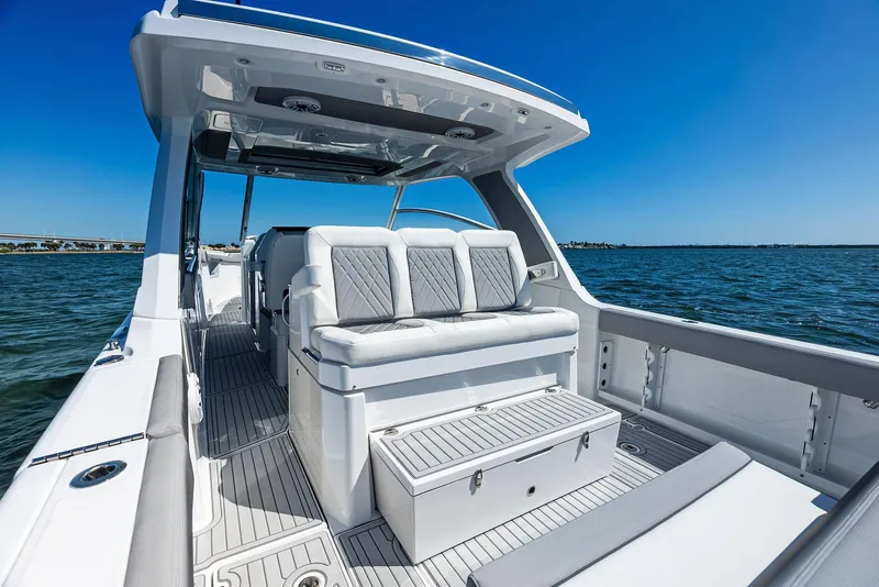 Slide: The Image of Interior of 2026 Everglades 367 CX boat, featuring sleek cabinetry and modern design elements. - 18