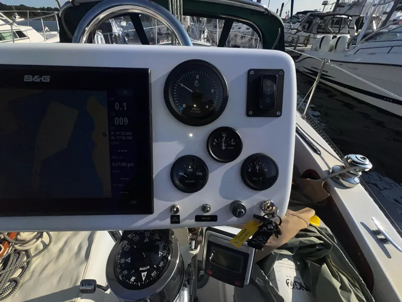 Slide: The Image of Cockpit of 1980 Pearson 32 sailboat with navigation instruments and gauges. - 20