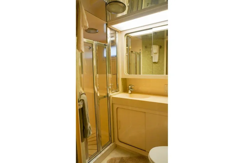 Slide: The Image of Bathroom interior of 1990 Hatteras 62 Cockpit Motor Yacht with shower and sink. - 49