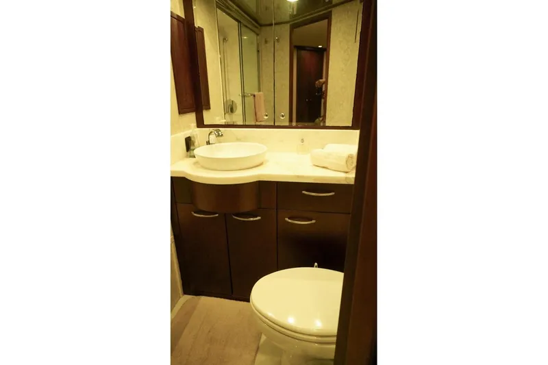 Slide: The Image of Bathroom interior of 1990 Hatteras 62 Cockpit Motor Yacht with modern fixtures. - 54